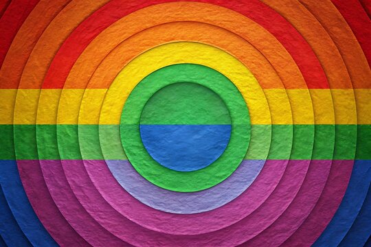 A concentric circle pattern in rainbow colors creates a vibrant background