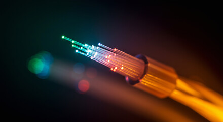 "Fiber optic cable glowing in macro. Abstract technology background for data and internet themes."

