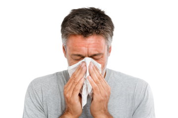 Sick man blowing nose into tissue with discomfort expression isolated on transparent background