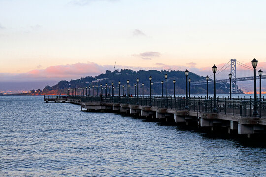 pier at sunset - Powered by Adobe