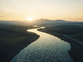 Networked waterway flowing into a sunrise lit valley showcasing connectivity