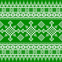 Fototapeta premium White cross-stitch ethnic seamless pattern on a green background. Pixel pattern. Tribal ornament. Folk motif. Ukrainian embroidery. Ideas for carpet, rug, wall tapestry, table runner, elaborate border