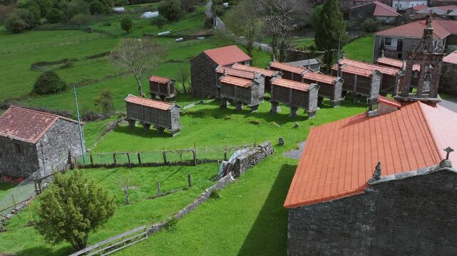 Ermita de la Virgen de los Remedios And Horreos Eira Da Ermida In Filgueira, Pontevedra, Spain. Aerial Drone Shot
