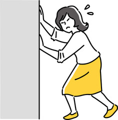 壁を押す女性
