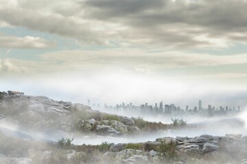 flat design illustration rocky outcrop is being shown on misty hillside featuring distant skyline