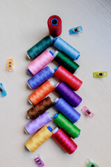 Christmas tree made of multi-colored thread spools. Christmas concept.