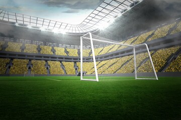 Large football stadium with lights