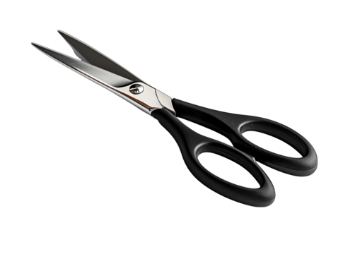 Open scissors with black handles on a black background