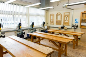 Flat design workshop is showcasing workbenches, drill presses, window blinds, frames, tool cabinets