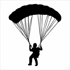 silhouette of a person parachuting