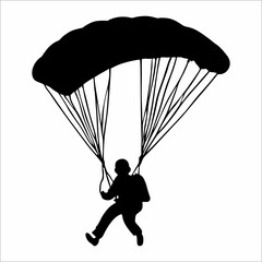 silhouette of a person parachuting