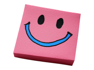 Pink post-it note with a hand-drawn smiley face