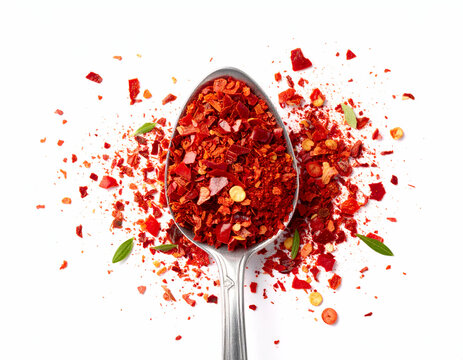 Spoonful of Paprika Vibrant Red Chili Flakes, Isolated on White