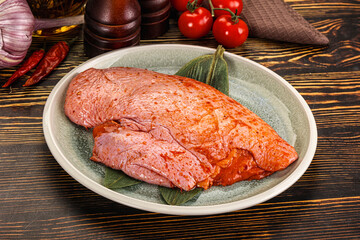 Raw marinated duck breast for cooking