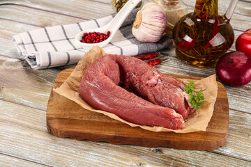 Raw pork tenderloin for cooking