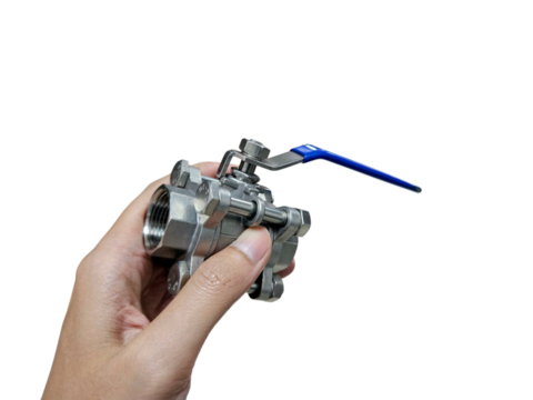 Hand presenting a stainless ball valve, perfect for engineering catalogs, plumbing product demonstrations, or industrial parts documentation. Isolated on white background, transparent PNG