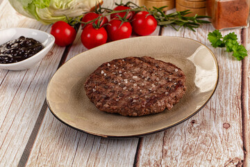 Grilled juicy beef cutlet for burger