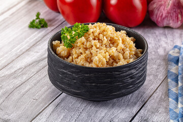 Vegan cuisine - boiled bulgur garnish