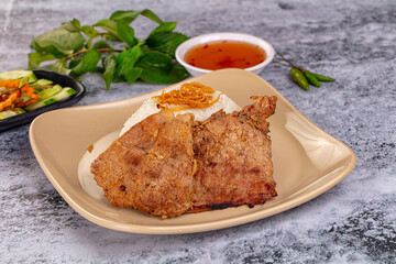 Roasted pork steak with rice