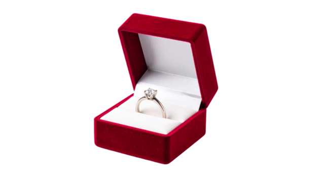 A red velvet ring box with a diamond engagement ring inside Isolated on Transparent or White Background