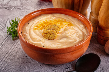 Tasty cheese cream soup with crouton