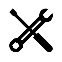 A wrench and screwdriver crossed isolated on white background