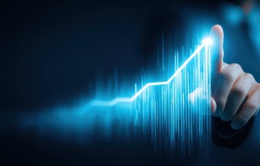 Hand touches upward trending graph (1)