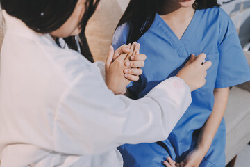 A doctor uses a stethoscope to check the heartbeat of his patient. Patients must undergo a yearly...