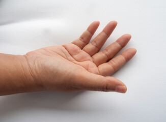 Female hand on white background. Palms up and top view. Healthcare and people concept. 