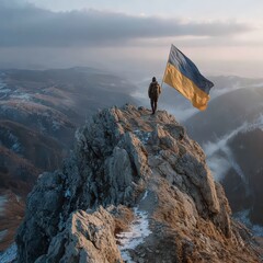 Leader holding Ukranian flag on mountain peak