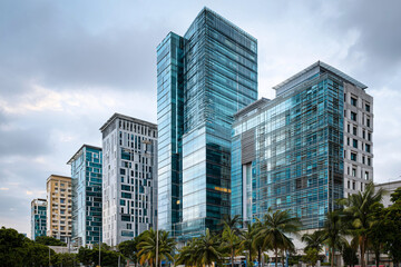 Modern architecture in Bengaluru, glass skyscrapers and urban scene, realistic lighting, 