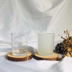 Minimalist Candle Holders on Wooden Coasters with Natural Decor
