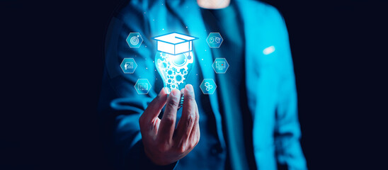 Businessman holding lightbulb with graduation cap and digital education icons. Concept of e-learning, knowledge innovation, online course, and artificial intelligence.