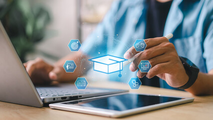 Student using stylus on tablet with graduation cap icon and digital education interface. Concept of...