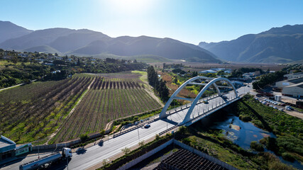 Aerial view of concrete tied-arch bridge in Ashton, Western Cape of South Africa, the only such bridge in the country, constructed using a transverse launch method. 