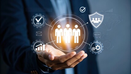 Businessman s hand displays digital interface with team security and growth icons