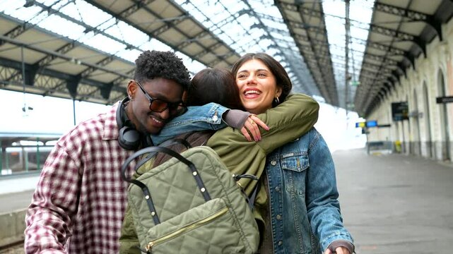 Friends reuniting at train station