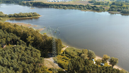 Electricity pylon over natural landscape