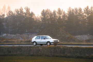 Retro compact vehicle on scenic drive