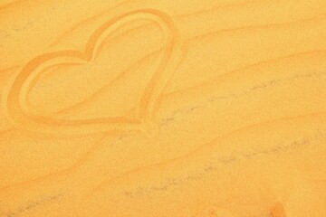 Heart Symbol Drawn on Sand Surface, Concept of Love, Romance and Valentine Day Theme.