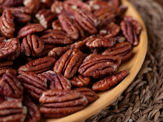 raw organic pecan nuts pattern background.