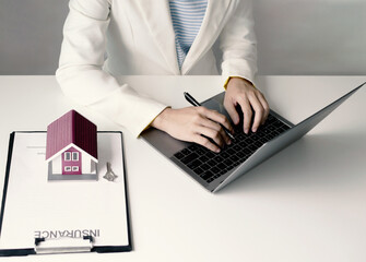 Real estate agents buy and sell houses and real estate online on