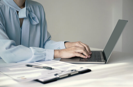 Businesswoman employer holding resume, recruiting, planning, evaluating and reviewing resume of job applicant, recruiting new employees, recruitment concept
