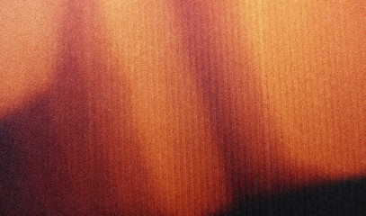 grainy colorful warm orange light leaks on black background with dust texture. abstract damaged...