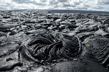 Close-up of solidified lava from the Kalapana flow on Hawaii’s Big Island, showcasing the...