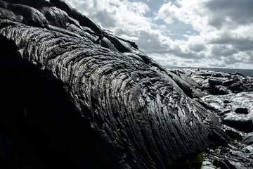 Close-up of solidified lava from the Kalapana flow on Hawaii’s Big Island, showcasing the...