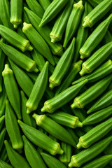 Fototapeta premium Fresh Raw Lady Finger Okra Vegetable Pile – Close-Up of Green Organic Produce