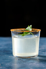 Elegant luxury cocktail in front of dark background