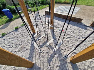 Climbing center, rope obstacle courses between treetops or rope ropes stretched from a pole and...