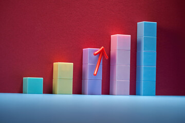 Colorful bars ascending in height from shortest to tallest with arrow sign